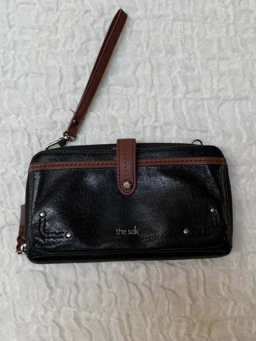 The Sak Smartphone Black and Brown Leather Wristlet